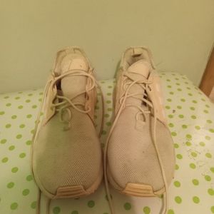 Adidas pink sneakers.